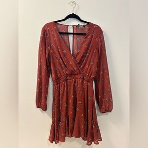 Dark orange long sleeve summer dress with floral pattern in a size large